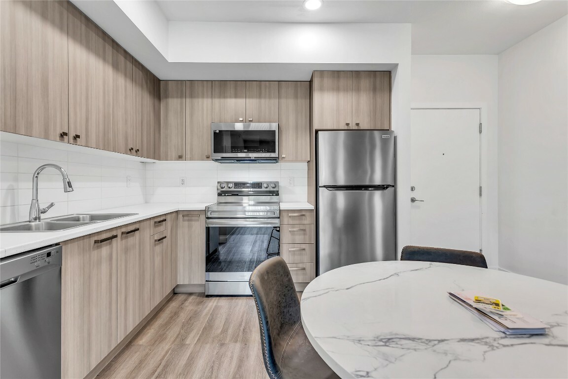 Property Photo: 935 Academy Way 322 BC V1V 3C9