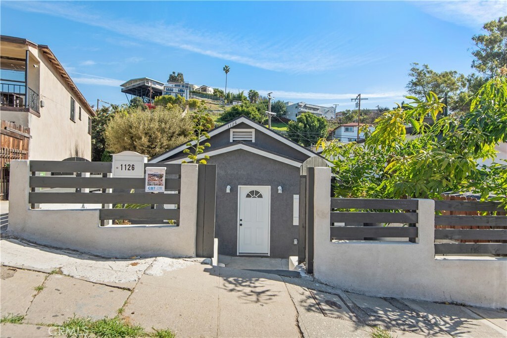 Property Photo:  1126 Stone St  CA 90063 