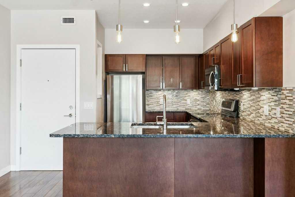 Property Photo: 4303 1 Street NE 232 AB T2E 7M3