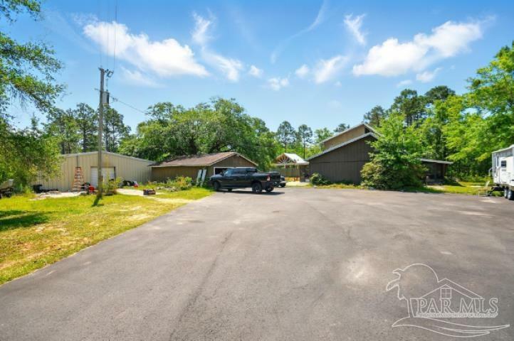 Property Photo: 2738 Garcon Point Rd FL 32583