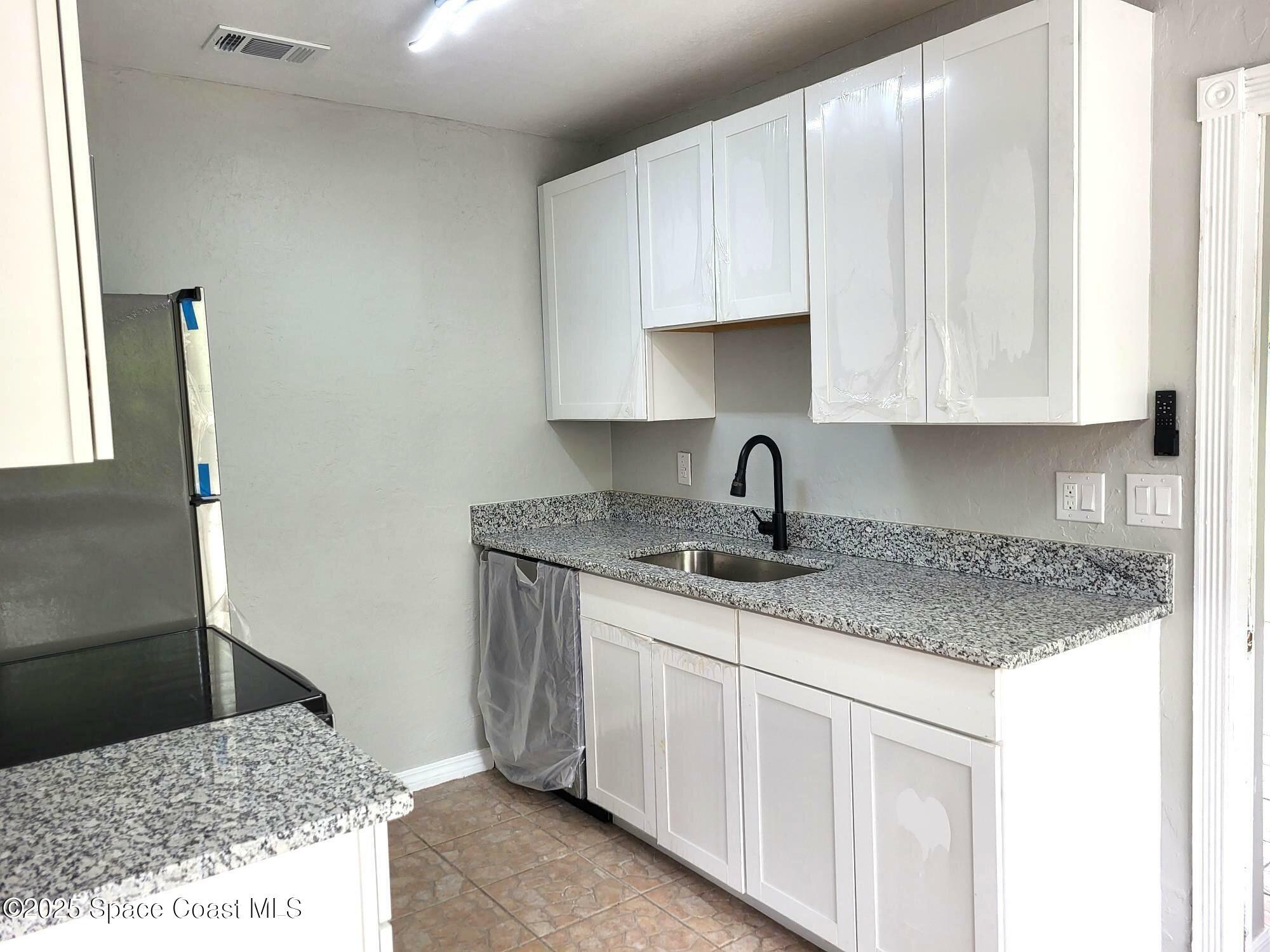 Property Photo: 1068 Barclay Drive FL 32927