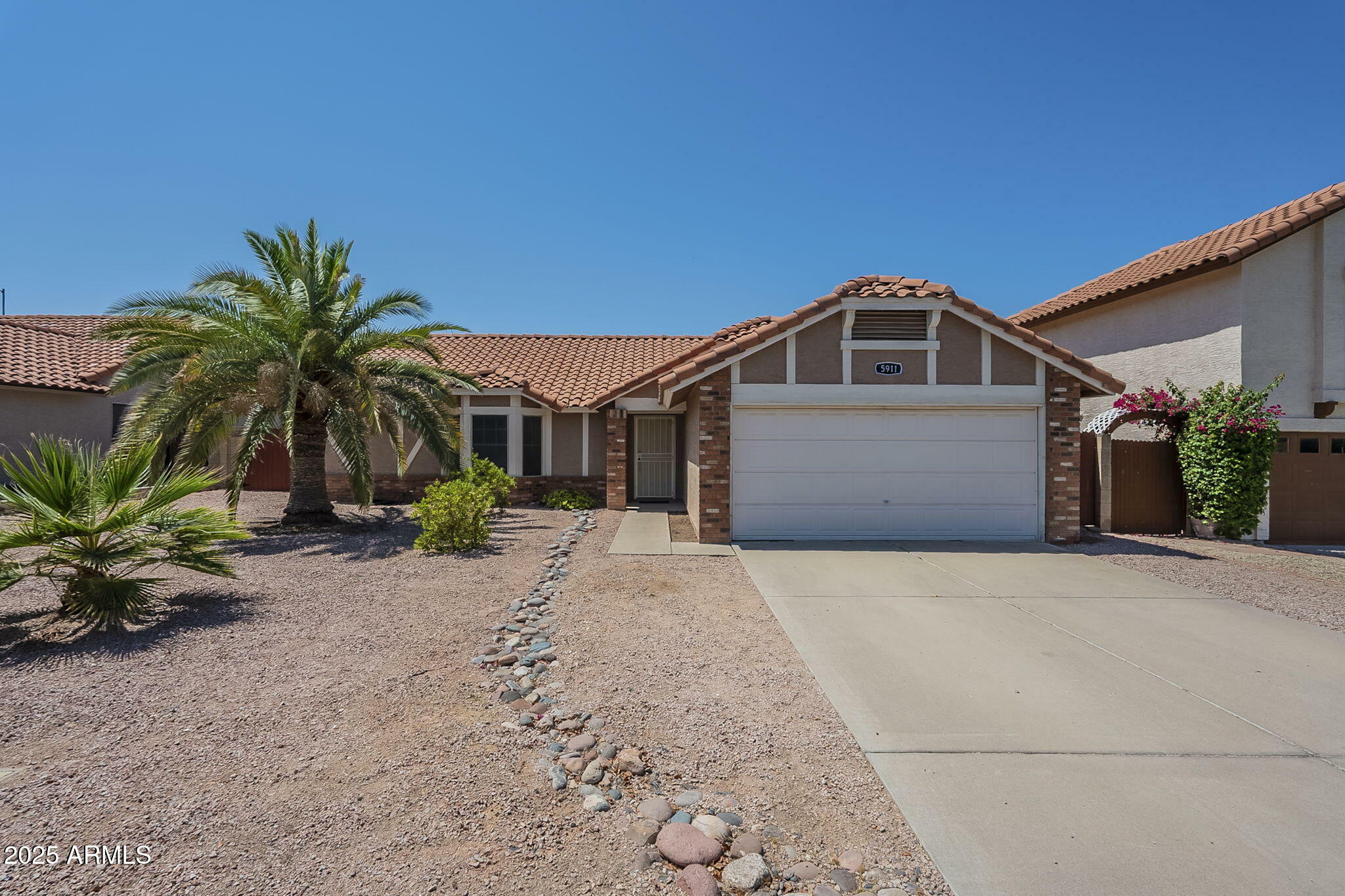 Property Photo: 5911 E Evergreen Street AZ 85205