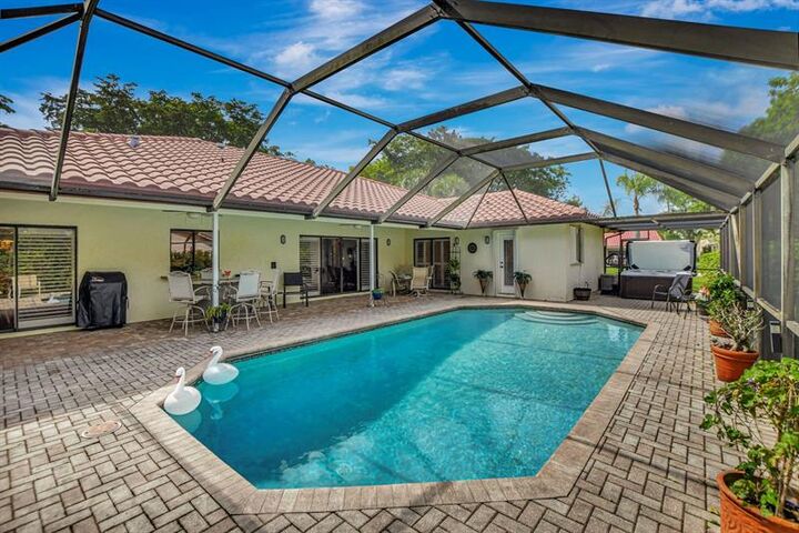 Property Photo: 243 Deer Creek Woodlake Circle FL 33442