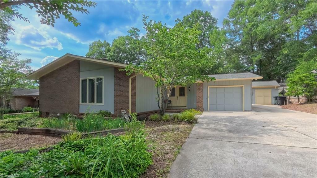 Property Photo:  1815 Hawthorne Lane  NC 27215 