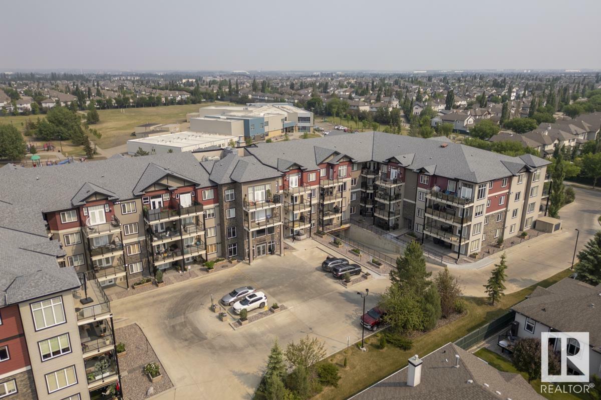Property Photo: 12408 15 Avenue SW 203 AB T6W 1X2