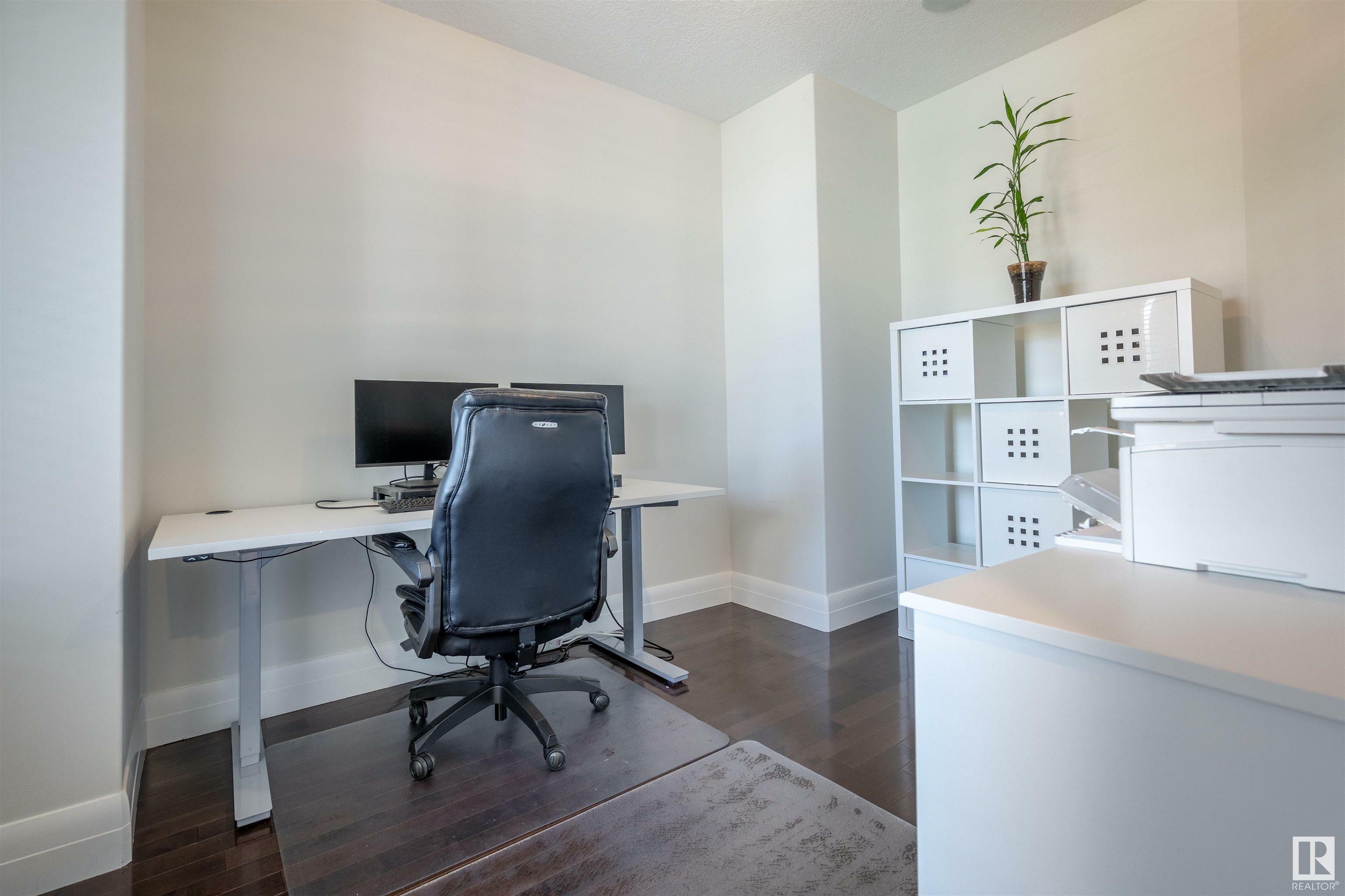 Property Photo: 10550 Ellerslie Road SW 20 AB T6W 0Y2