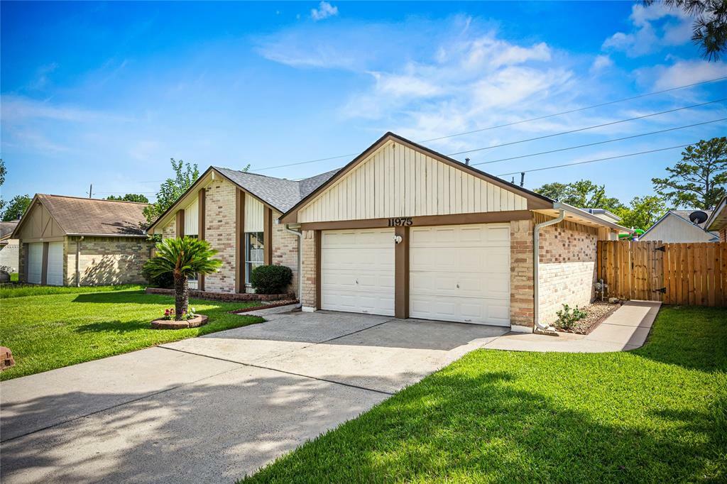 Property Photo: 11975 Steamboat Springs Drive TX 77067