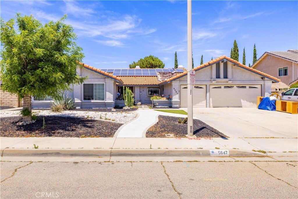 Property Photo:  5647 Redwood Ave  CA 93551 
