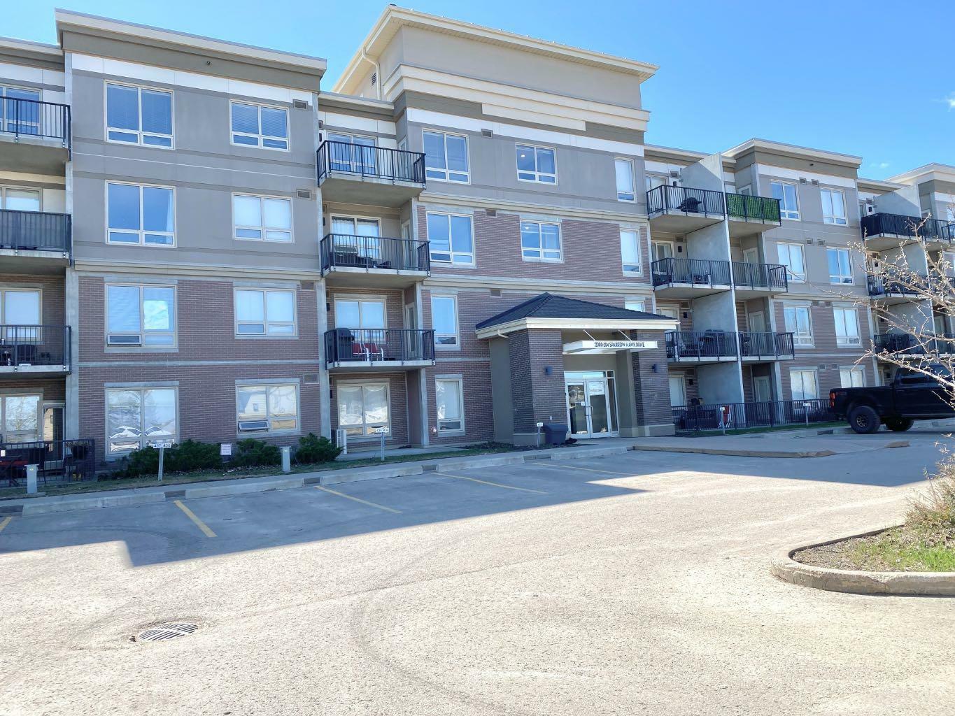 Property Photo: 204 Sparrow Hawk Drive 2201 AB T9K 0P1