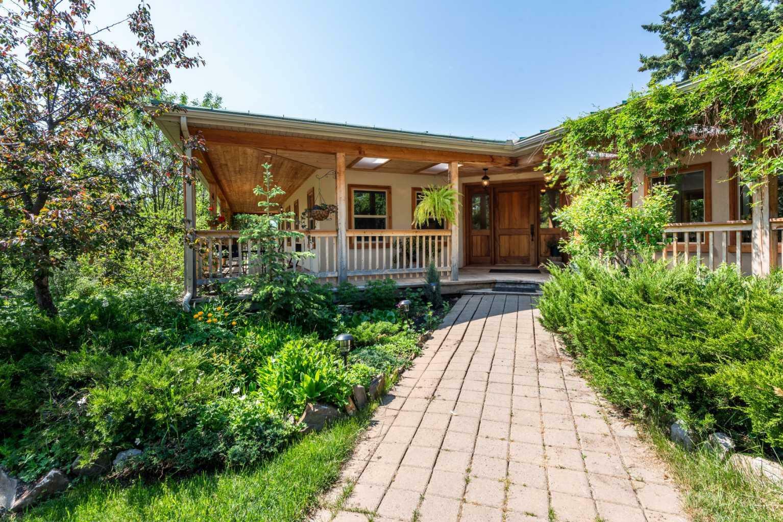 Property Photo: 242211 1280 Drive W AB T0L 1K0