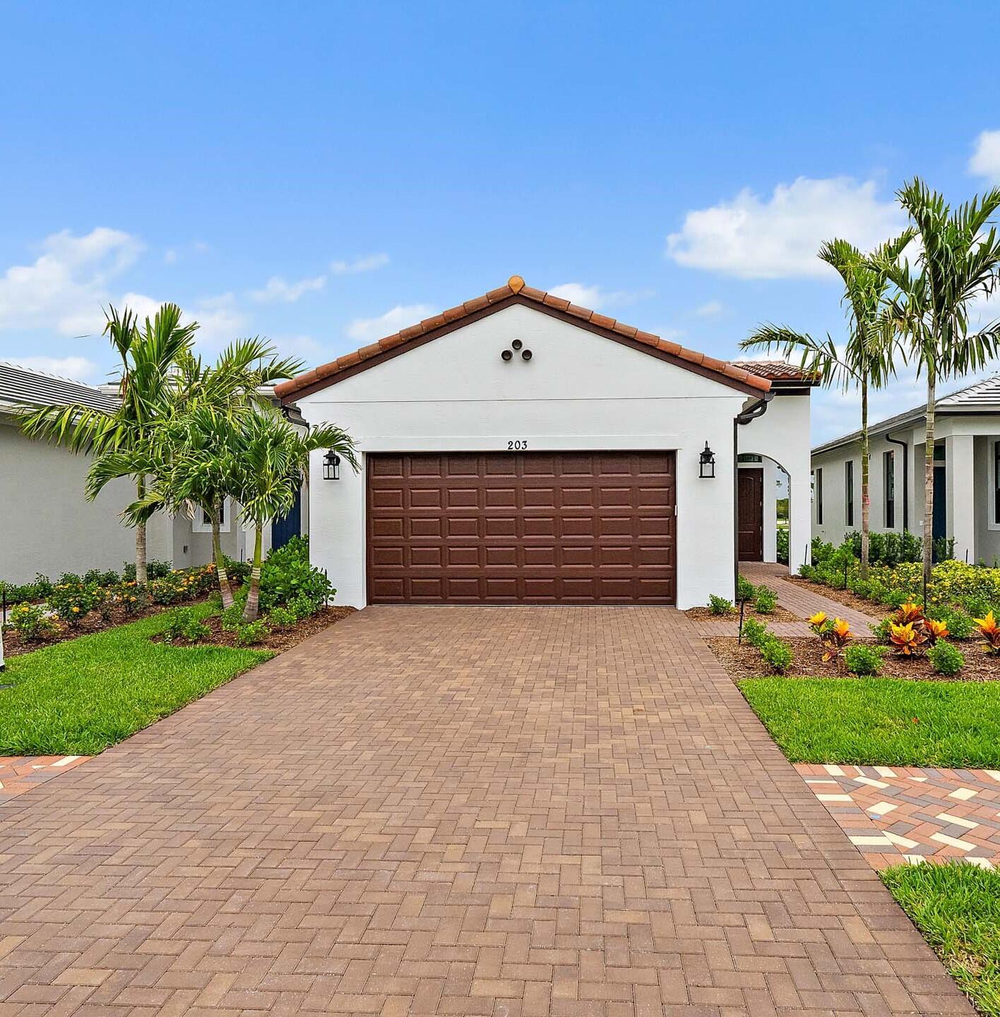 Property Photo: 203 SE Via Sangro FL 34952