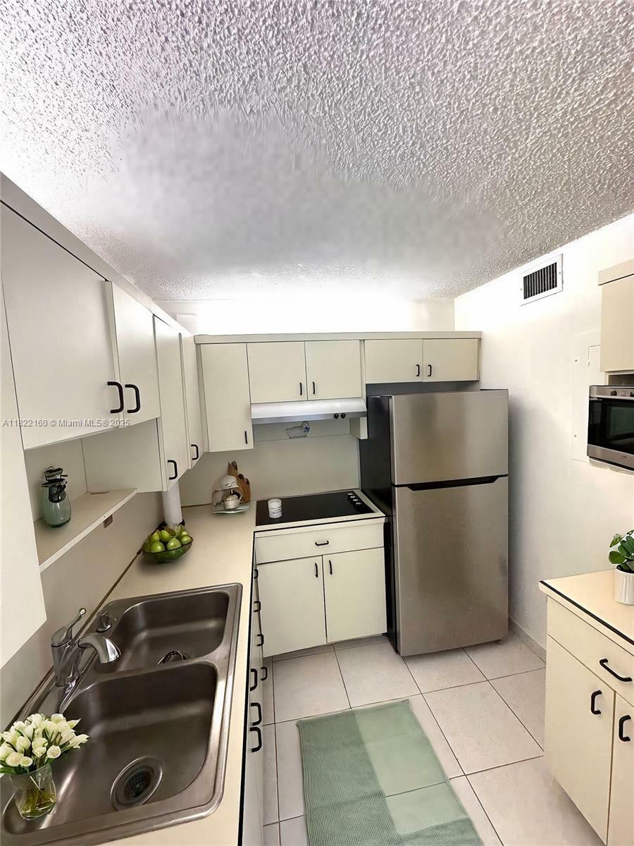 Property Photo: 4675 W 18th Ct 801 FL 33012