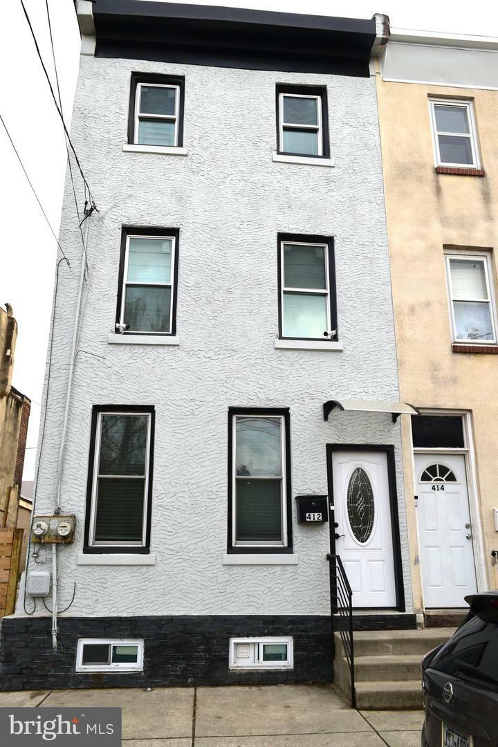 Property Photo: 412 W Norris Street PA 19122