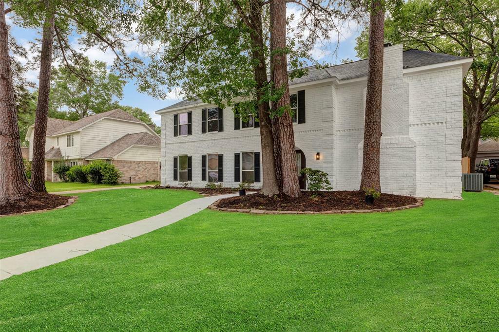 Property Photo: 7707 12th Fairway Lane TX 77346