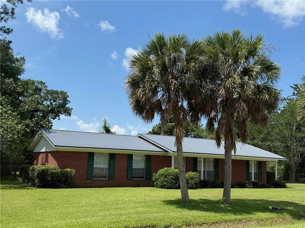 Property Photo: 215 Palm Avenue W AL 36535