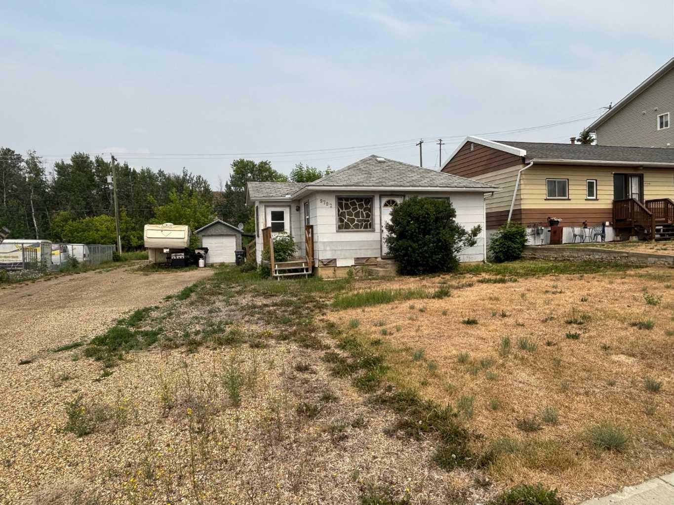 Property Photo: 9702 94 Avenue AB T8S 1J1