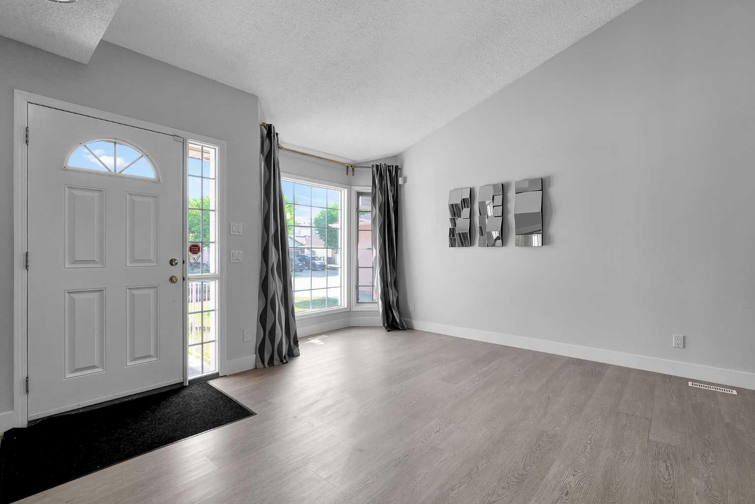 Property Photo: 30 Hidden Circle NW AB T3A 5G9