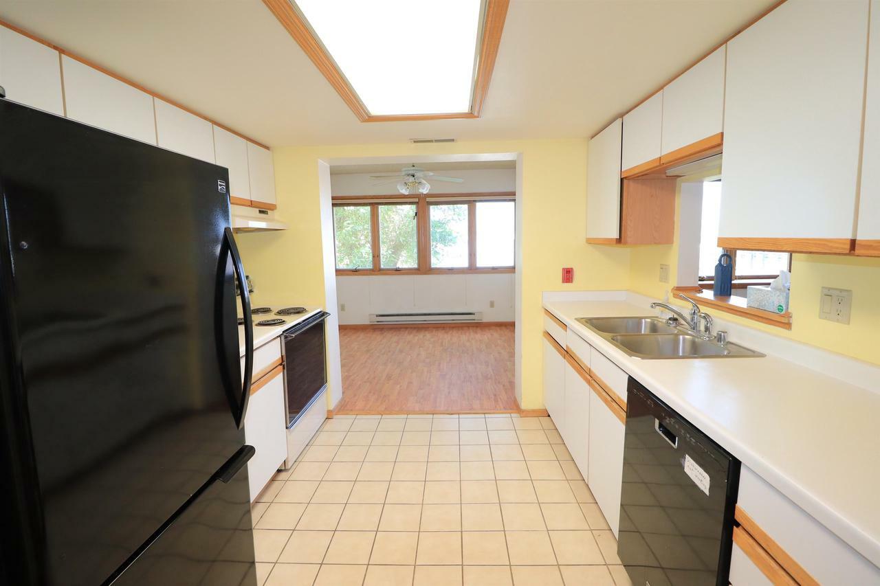 Property Photo: 1 Maple Wood Lane 202 WI 53704