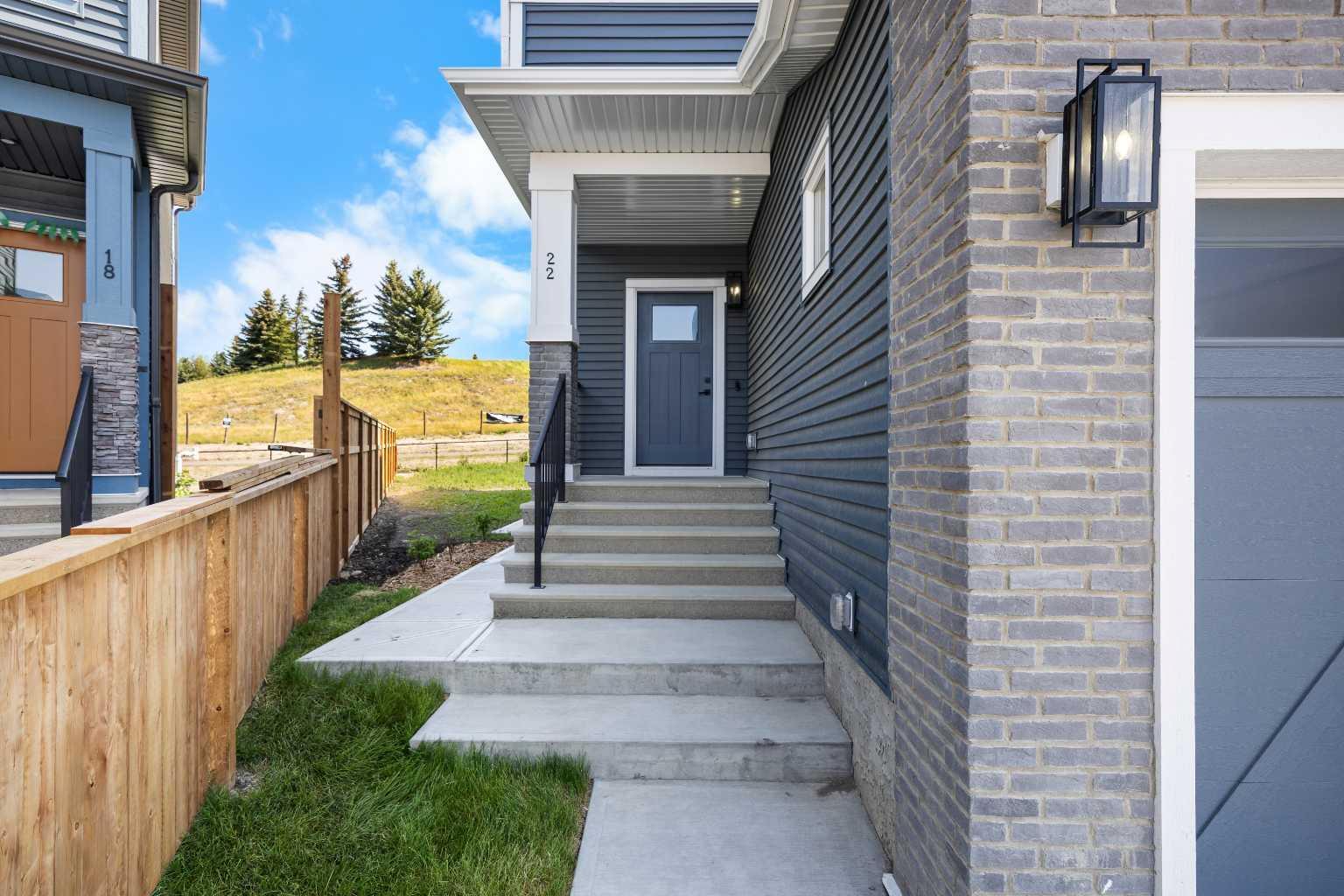 Property Photo: 22 Crimson Ridge Cove NW AB T3L 0K4