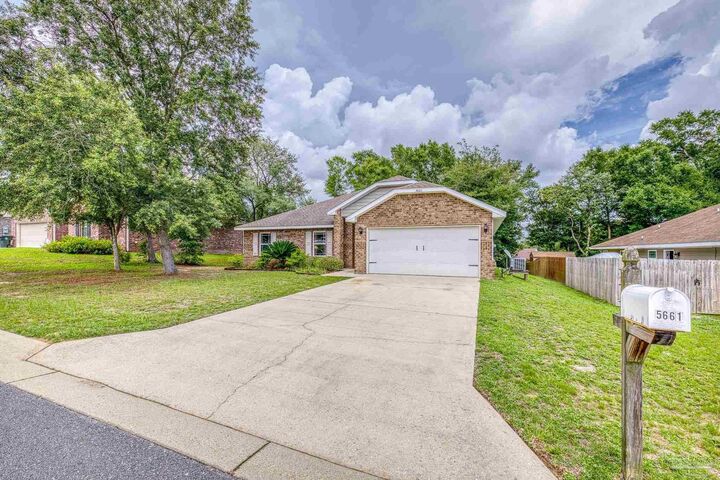 Property Photo:  5661 Maggie Rose Cir  FL 32570 