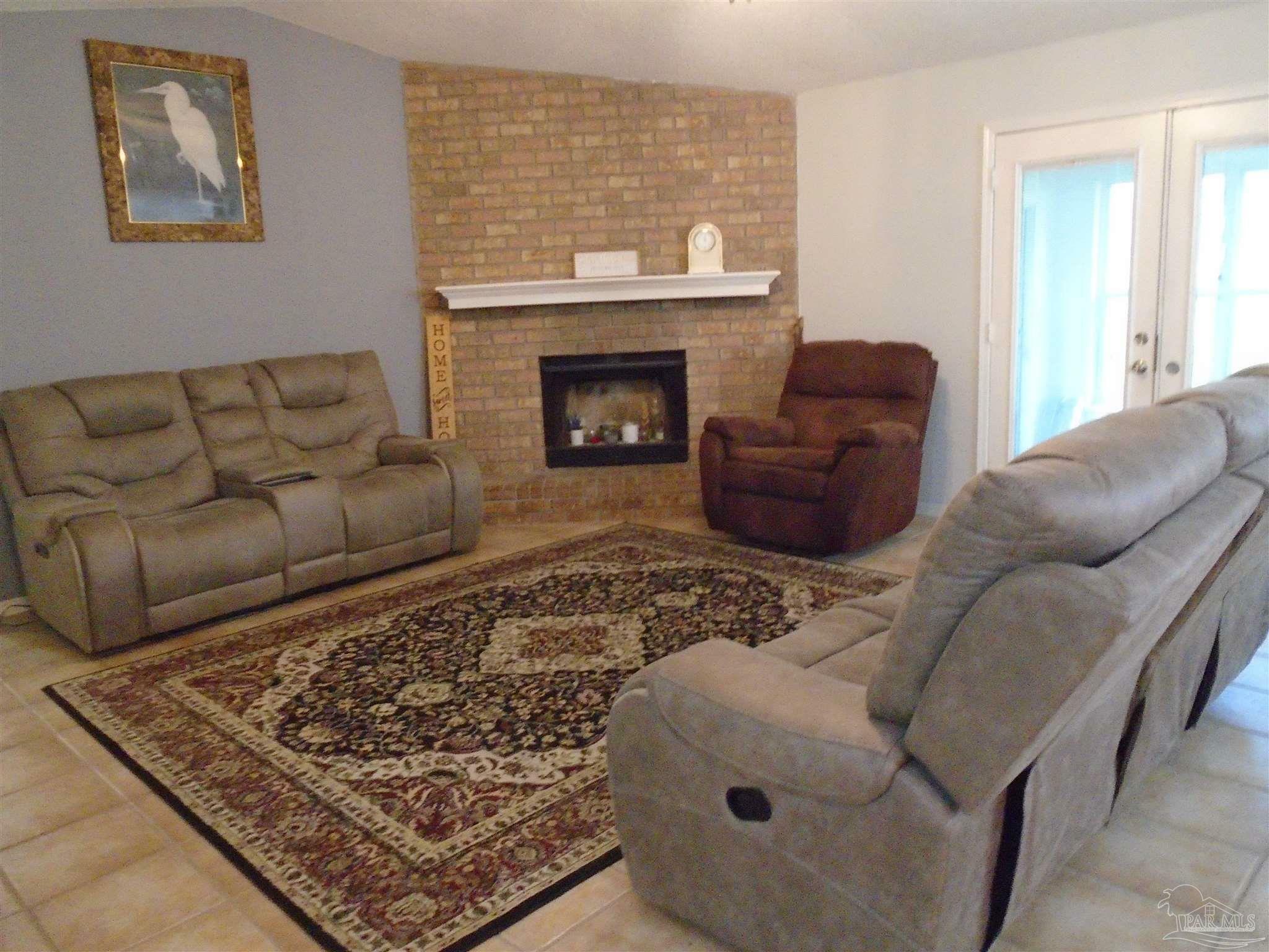 Property Photo: 7067 Pine Blossom Rd FL 32570