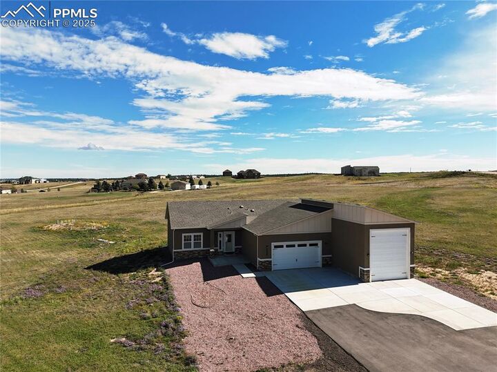 Property Photo:  6986 Marshbern Court  CO 80908 