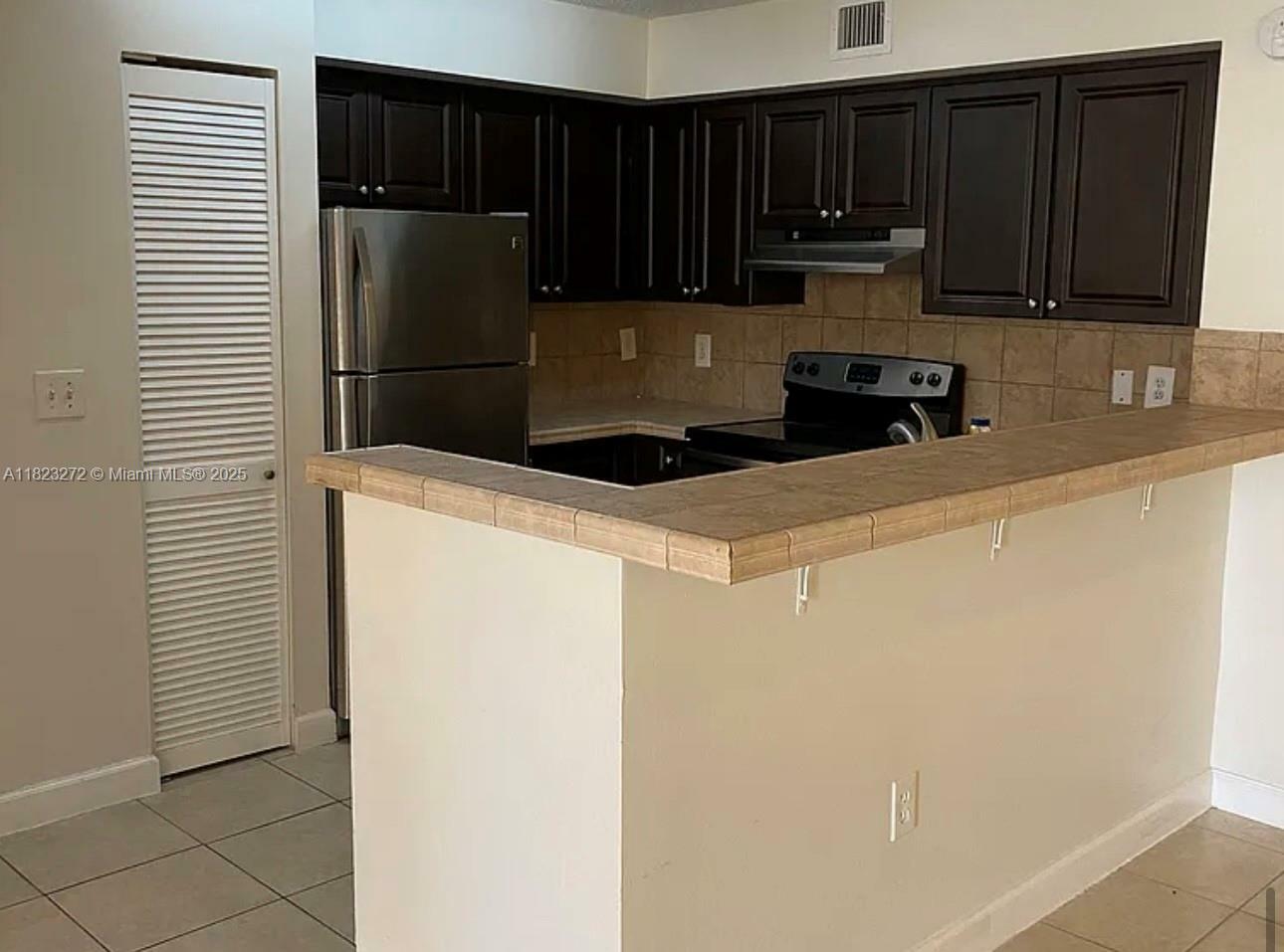 Property Photo:  1733 Village Blvd 105  FL 33409 