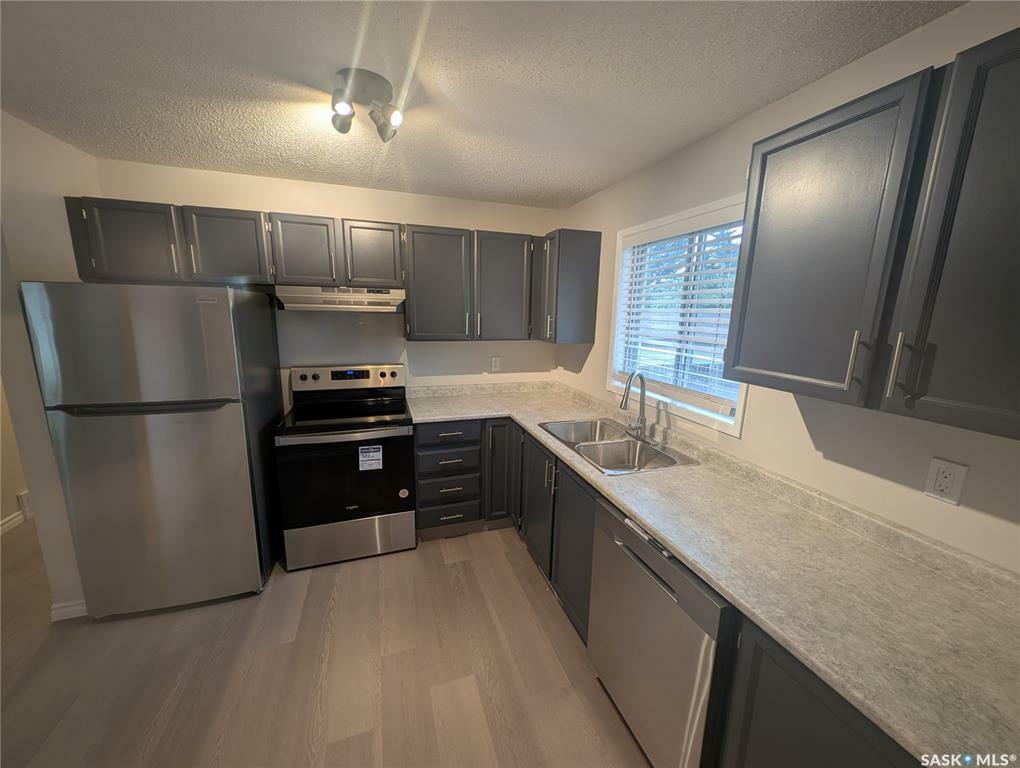 Property Photo: 238 Stillwater Drive SK S7J 4K3