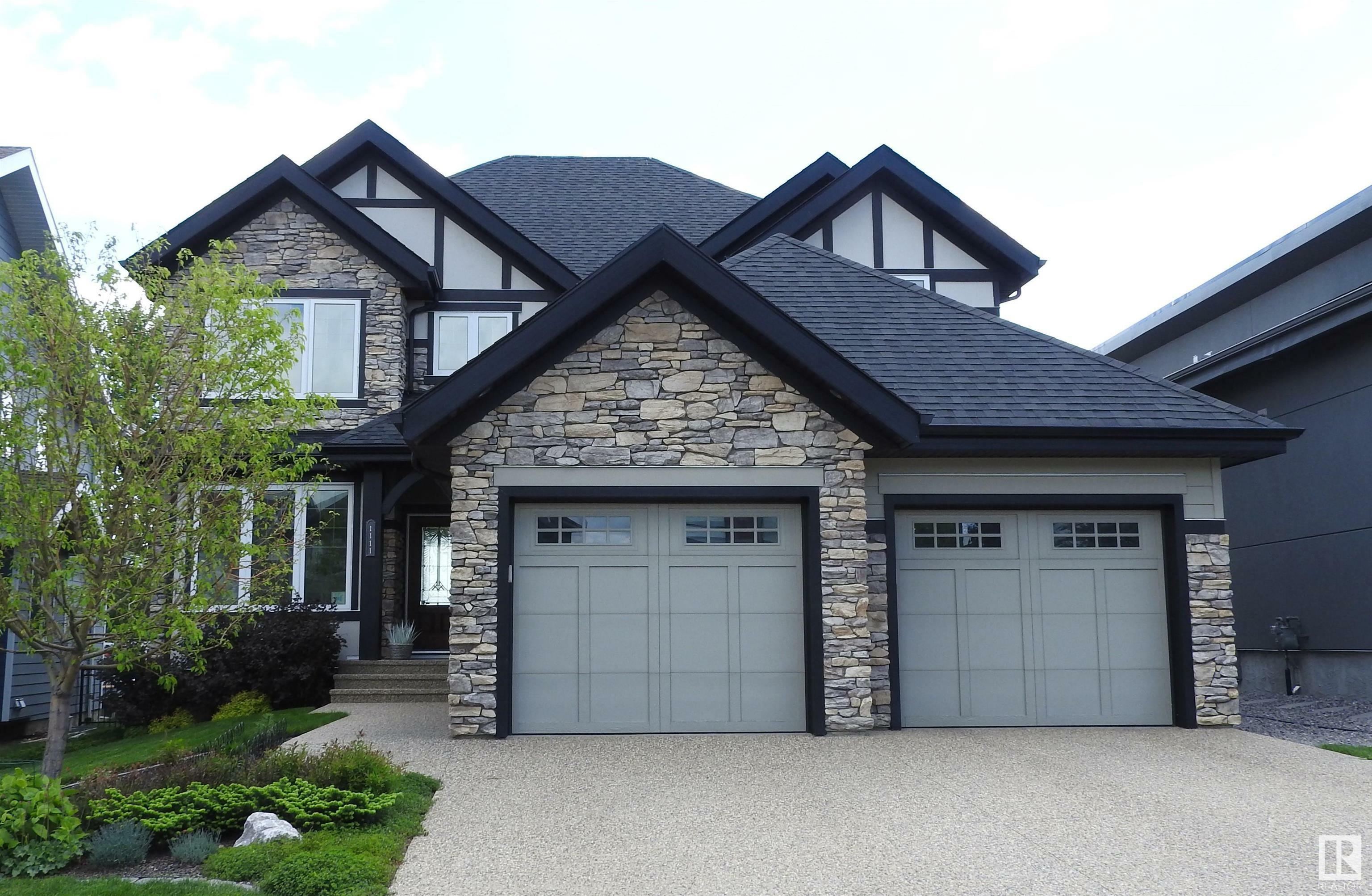 Property Photo: 1111 Hainstock Green SW AB T6W 2T8