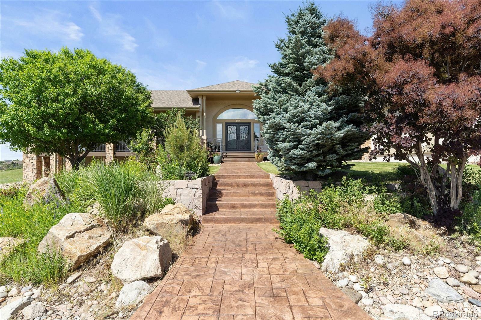 Property Photo: 3358 Castle Butte Drive CO 80109