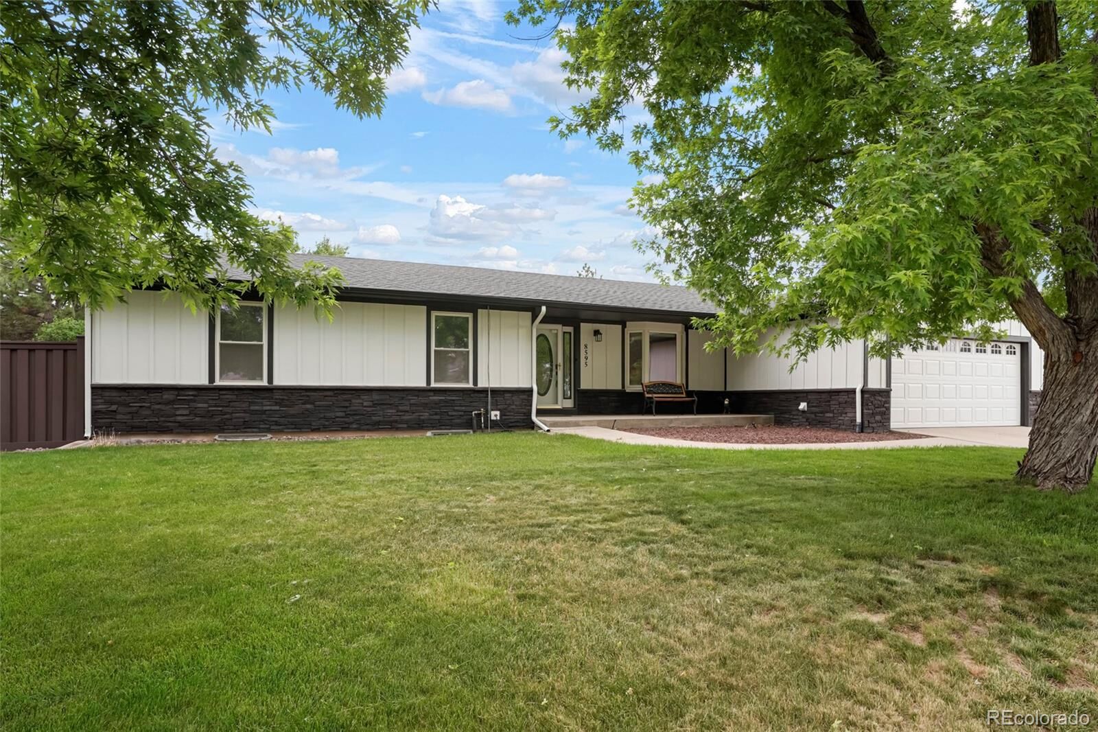 Property Photo: 8595 S Yarrow Street CO 80128