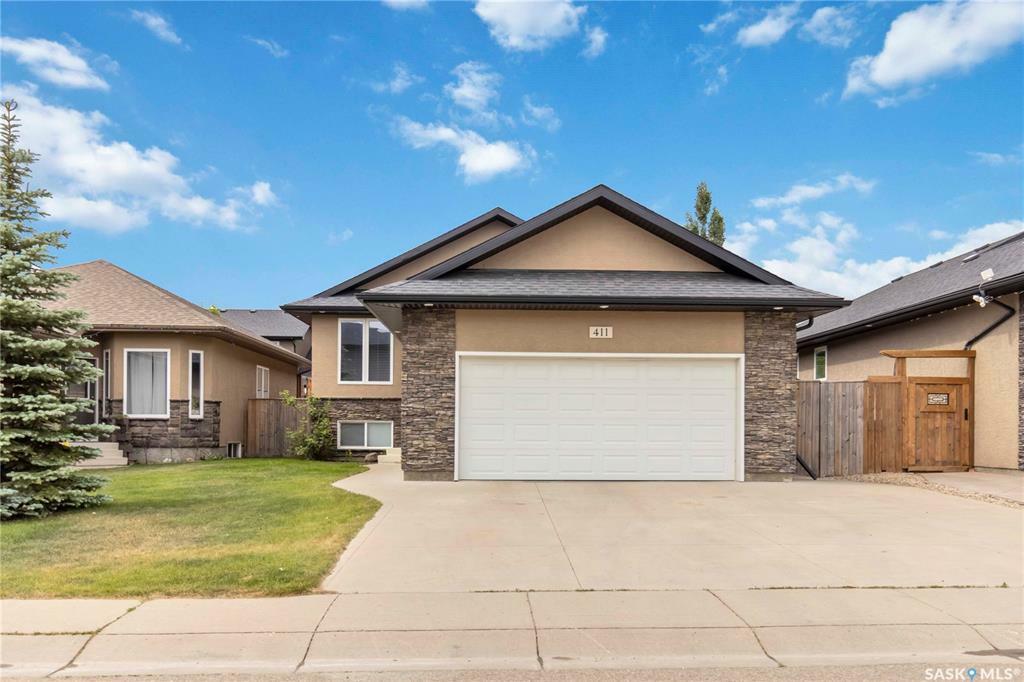 Property Photo: 411 Rempel Lane SK S7T 0J3
