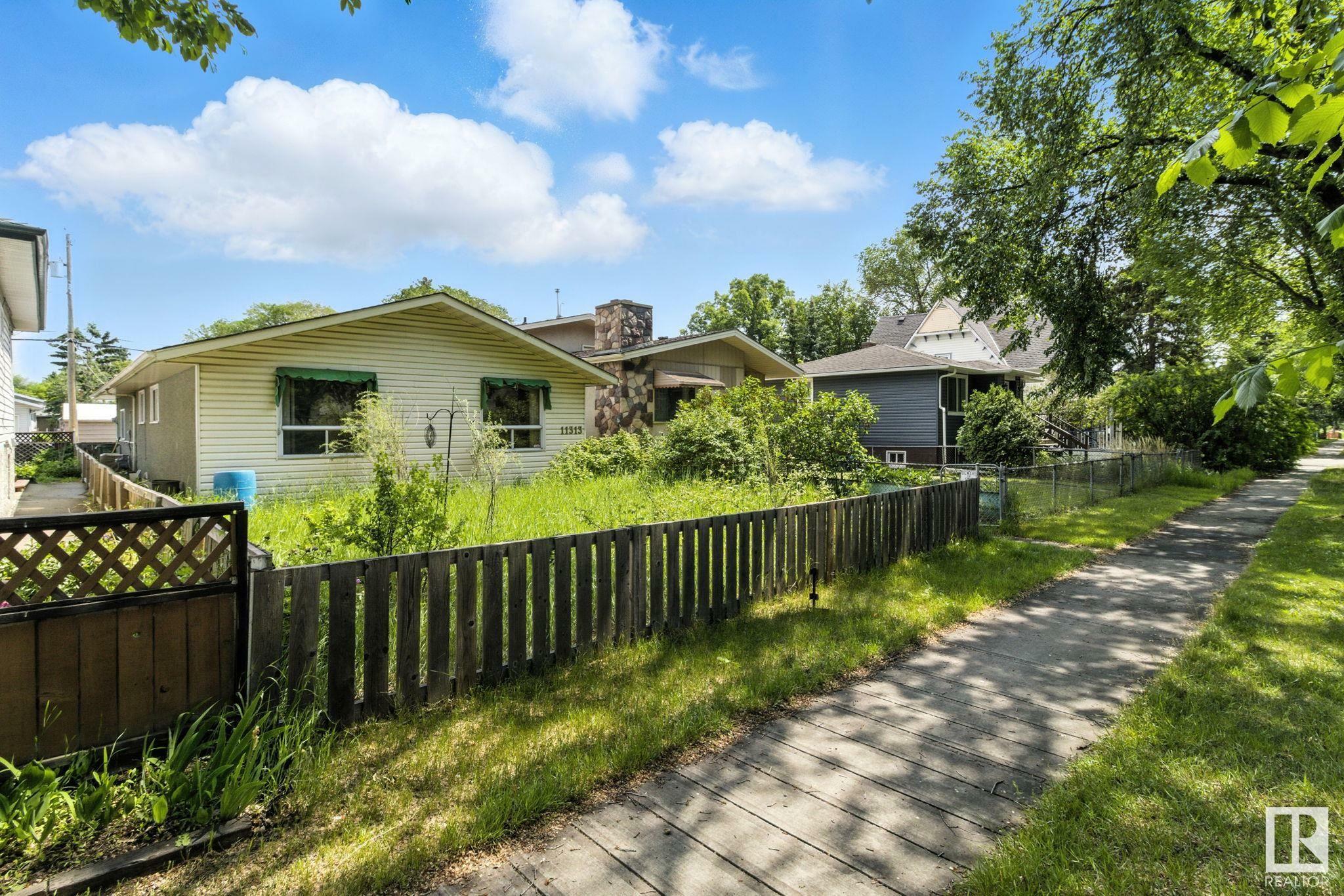 Property Photo: 11313 87 Street NW AB T5V 3L8