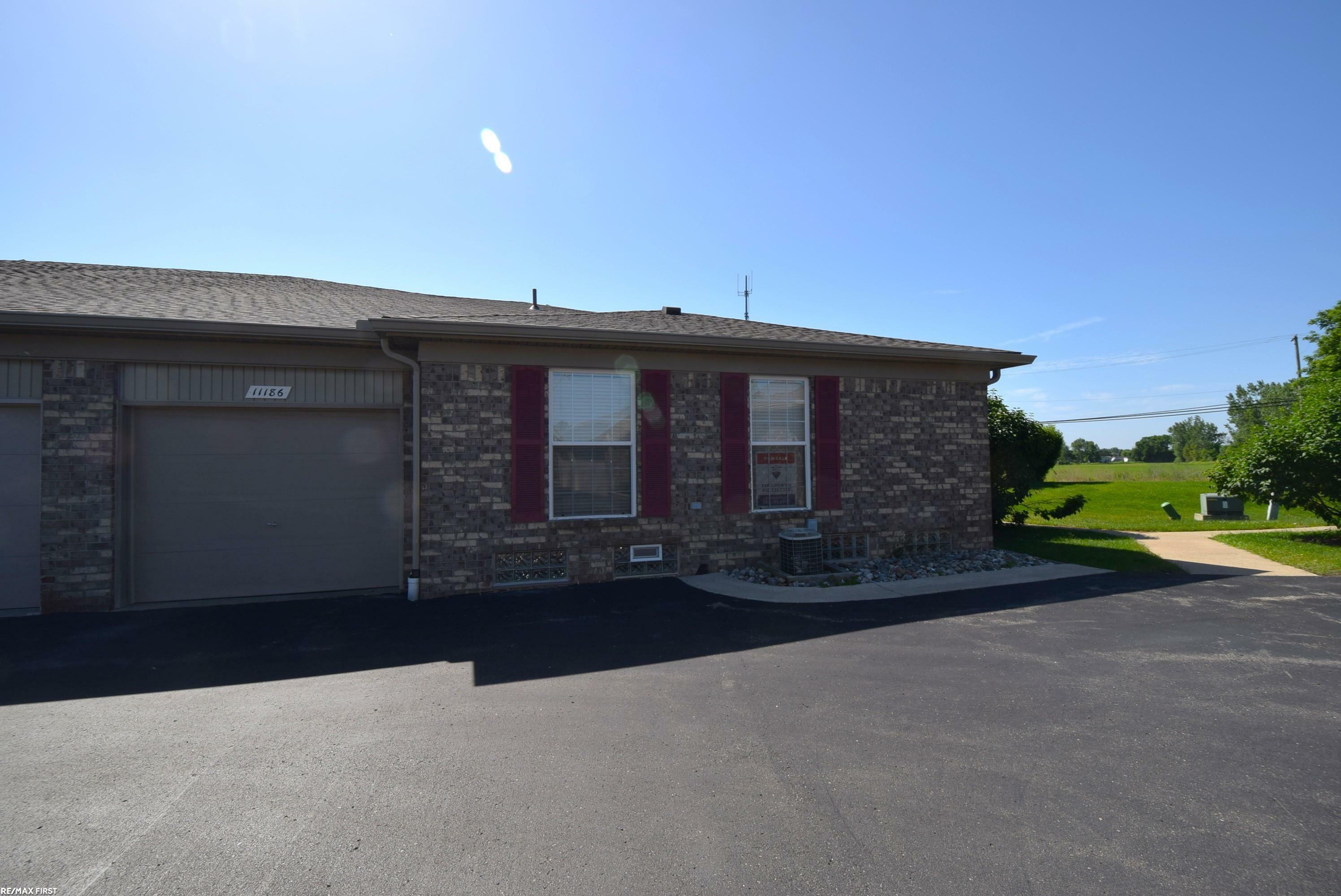 Property Photo: 11186 Spruce Court 105 MI 48094