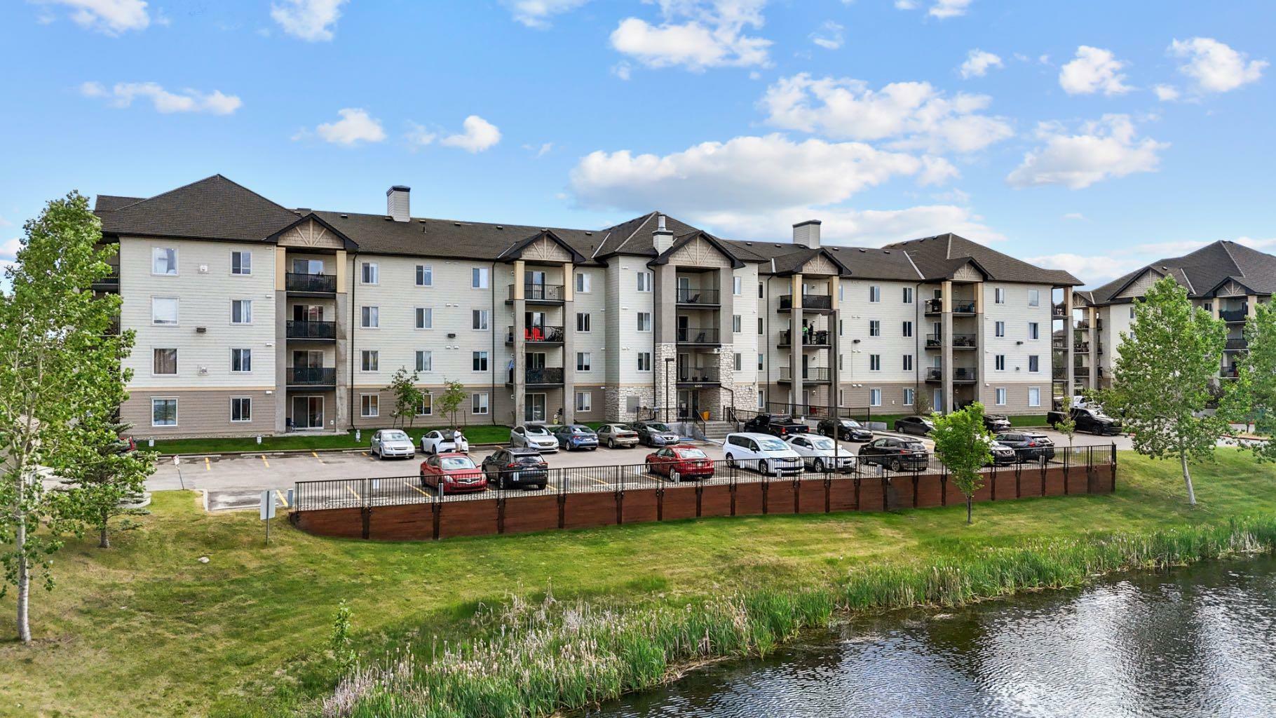 Property Photo: 304 Mackenzie Way SW 6406 AB T4B 3H6