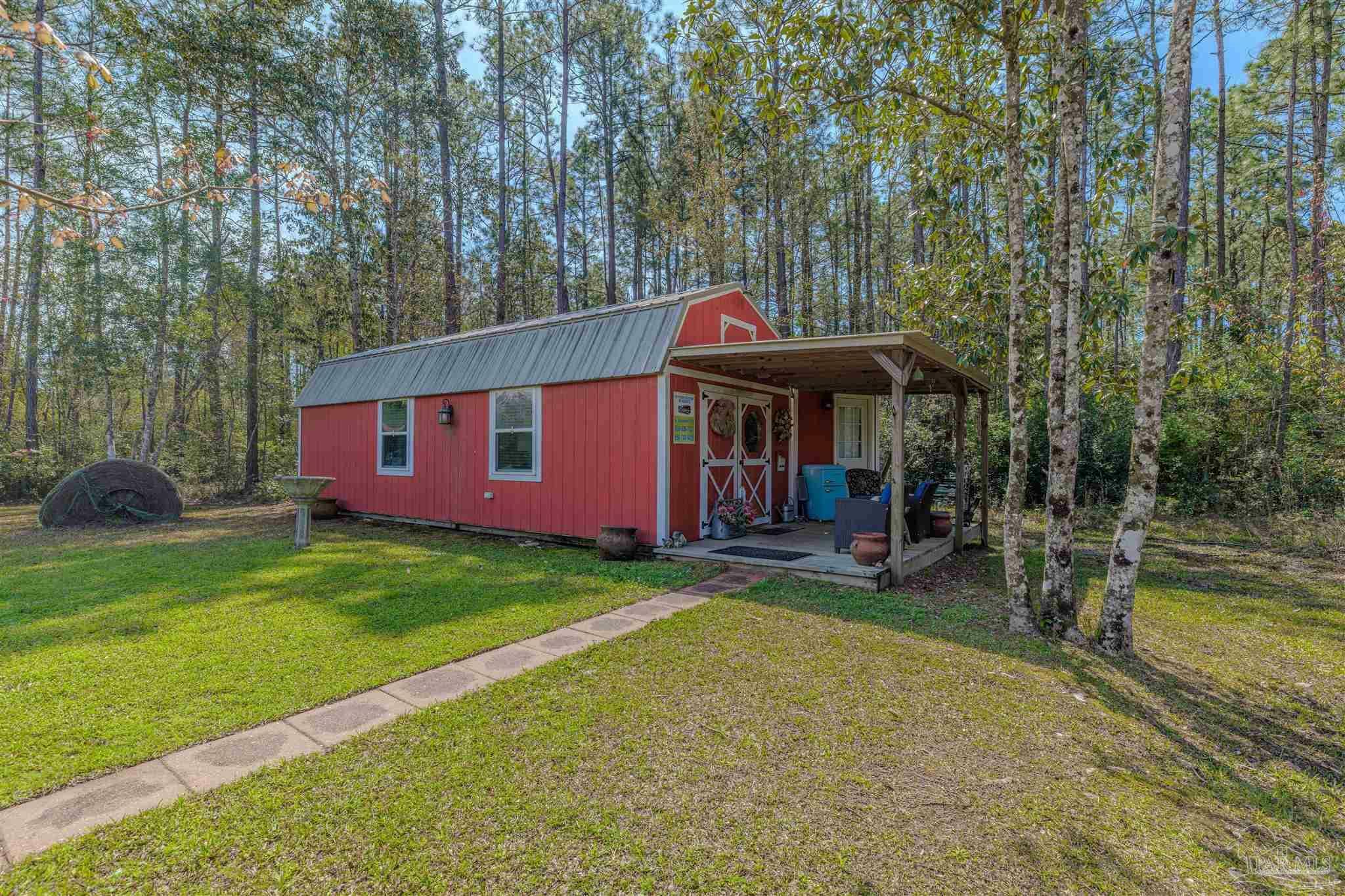 Property Photo: 4176 Coachman Rd FL 32583