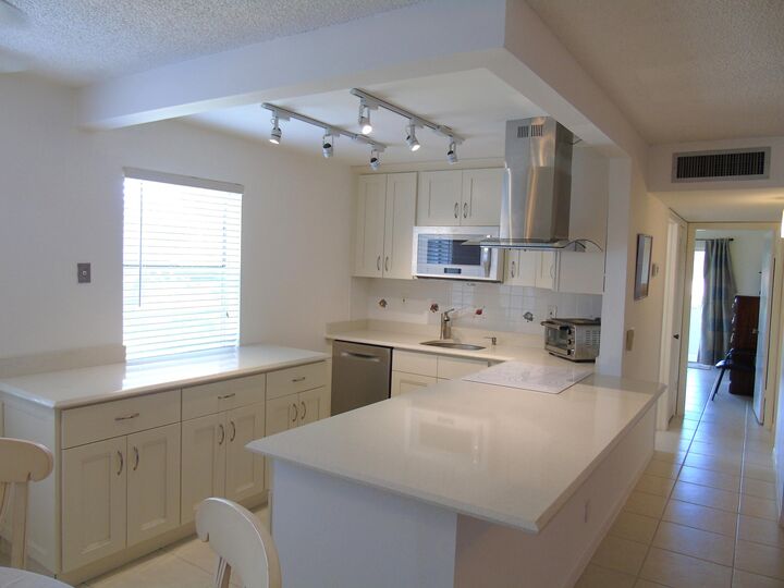 Property Photo: 219 Normandy E FL 33484