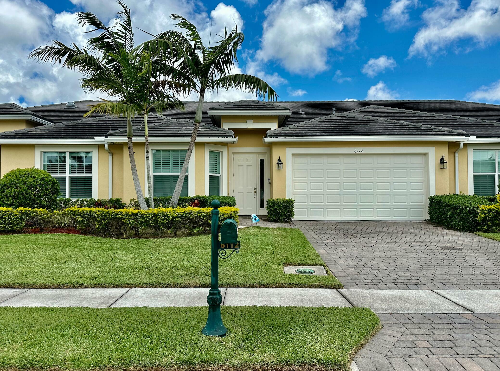 Property Photo: 6112 NW Cullen Way FL 34983