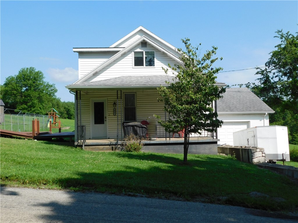 Property Photo:  577 Woodside Old Frame Road  PA 15478 
