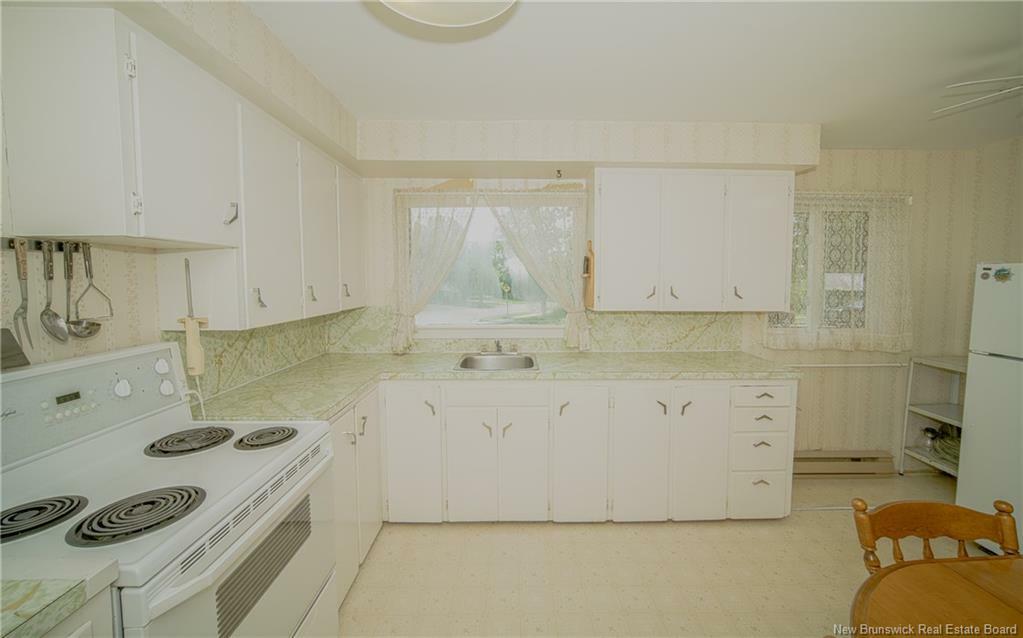 Property Photo: 601 Hillcrest Drive NB E3A 2X8