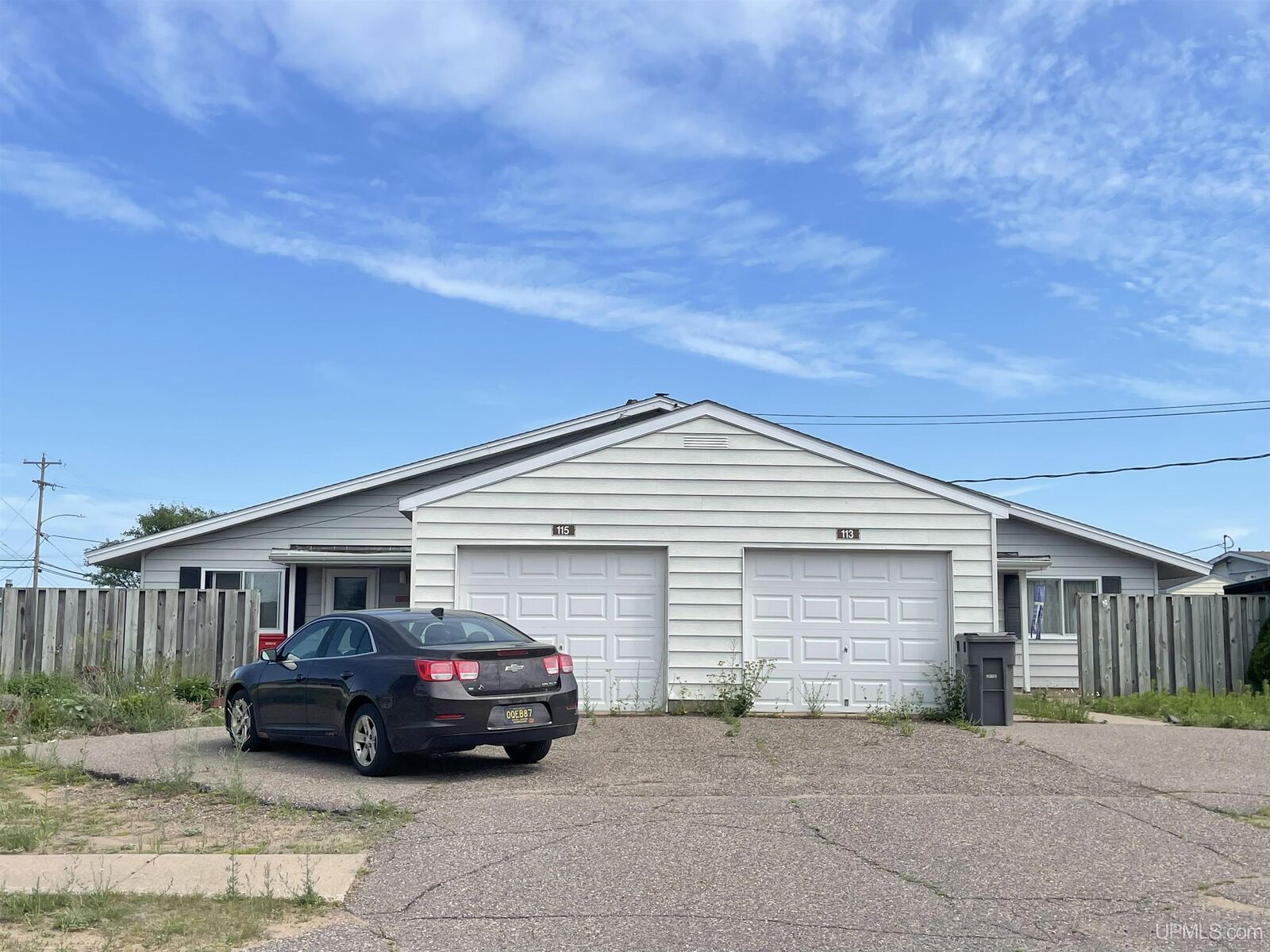 Property Photo:  113-115 Destroyer Street  MI 49841 