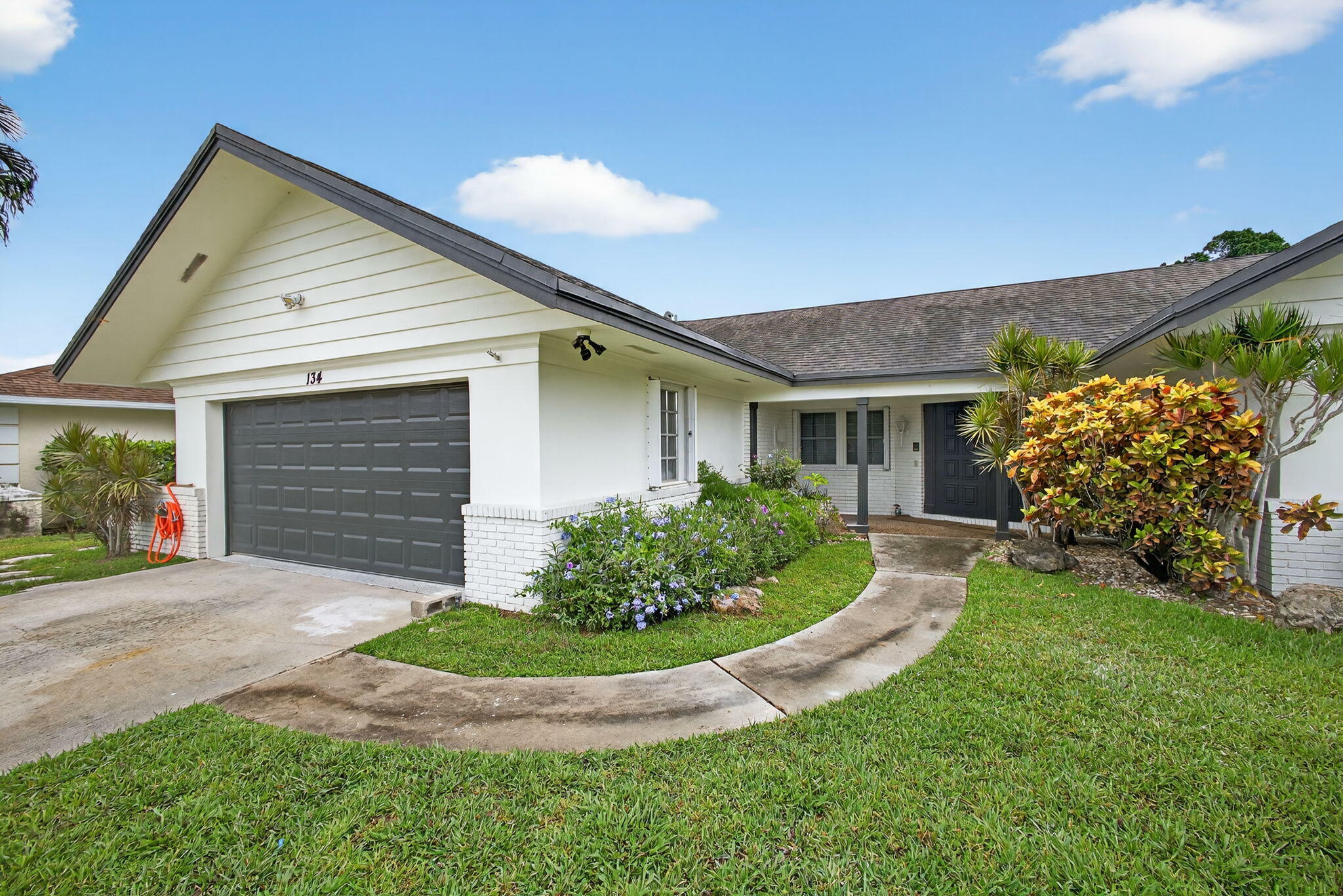 Property Photo: 134 Meadowlark Drive FL 33411