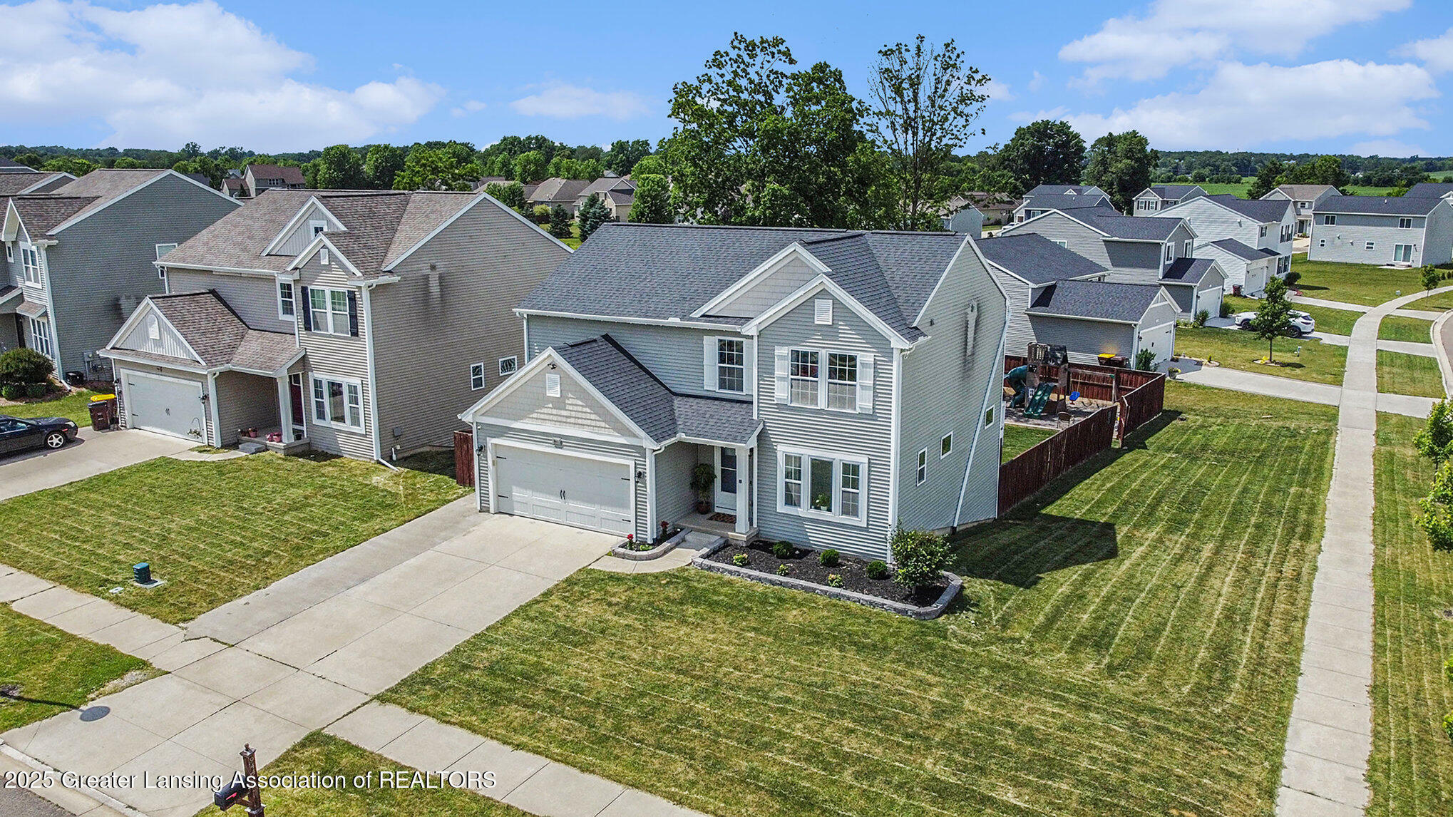 Property Photo:  944 Pennine Ridge Way  MI 48837 