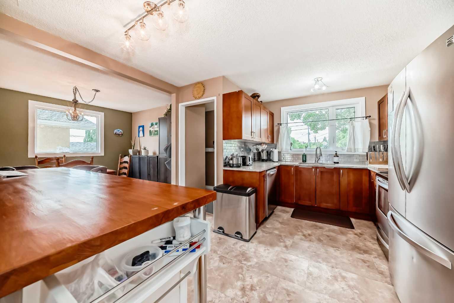 Property Photo: 811 71 Avenue NW AB T2K 0N6