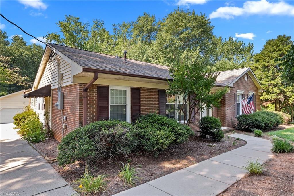 Property Photo:  5711 Greenview Drive  NC 27409 