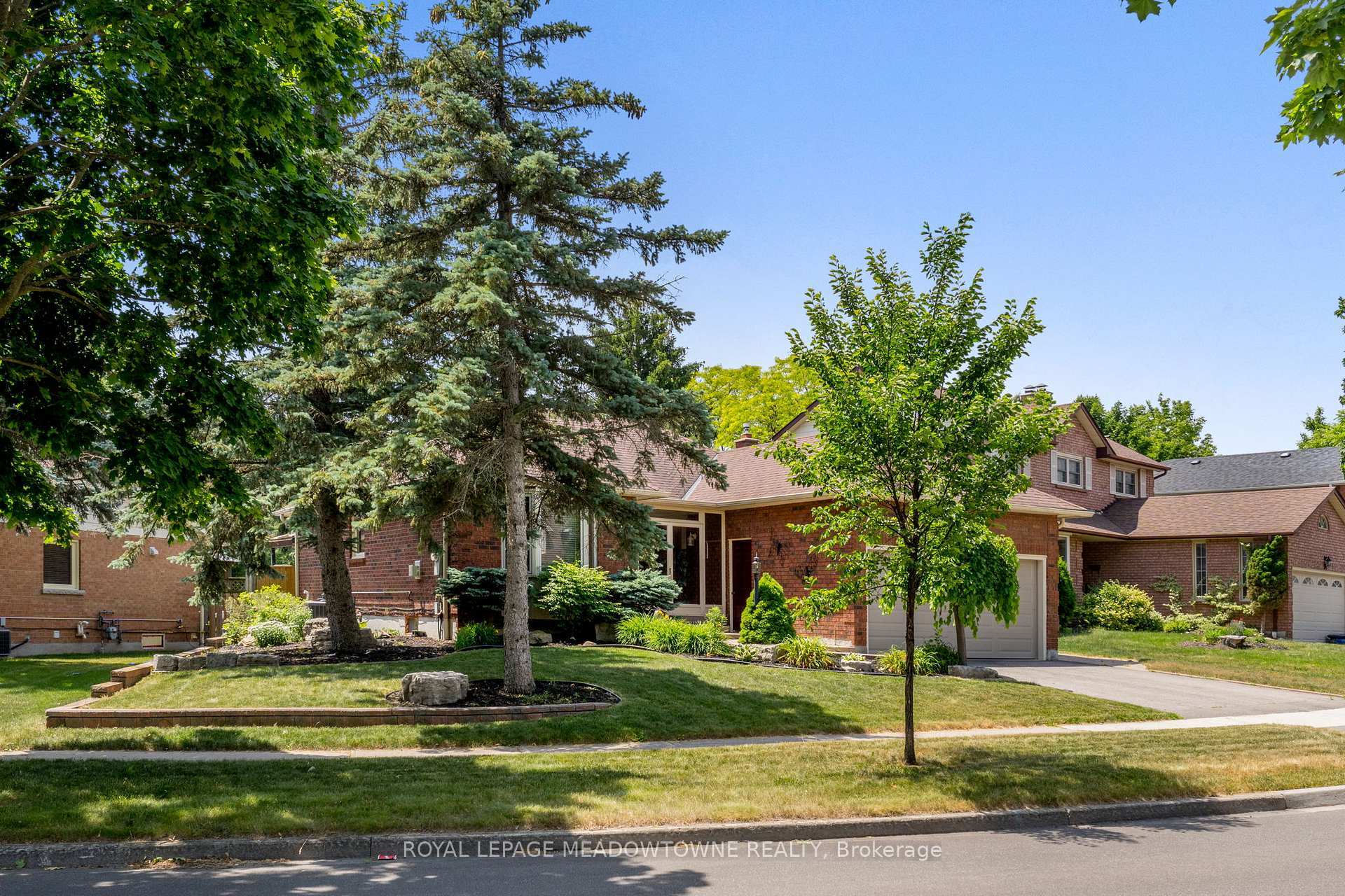 Property Photo: 52 Canadian Oaks Drive ON L1N 6W8