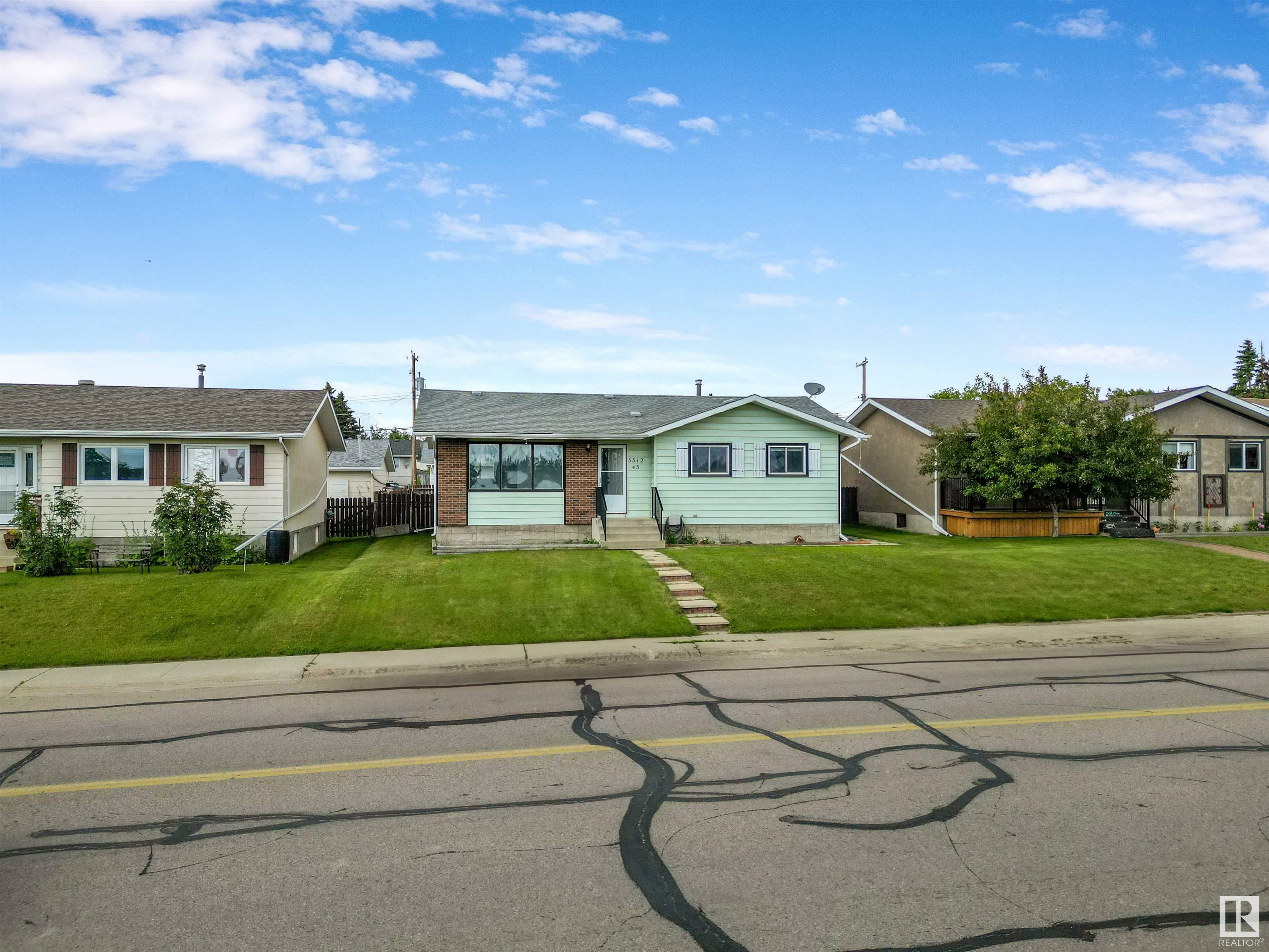 Property Photo: 5512 45 Avenue AB T7A 1K3