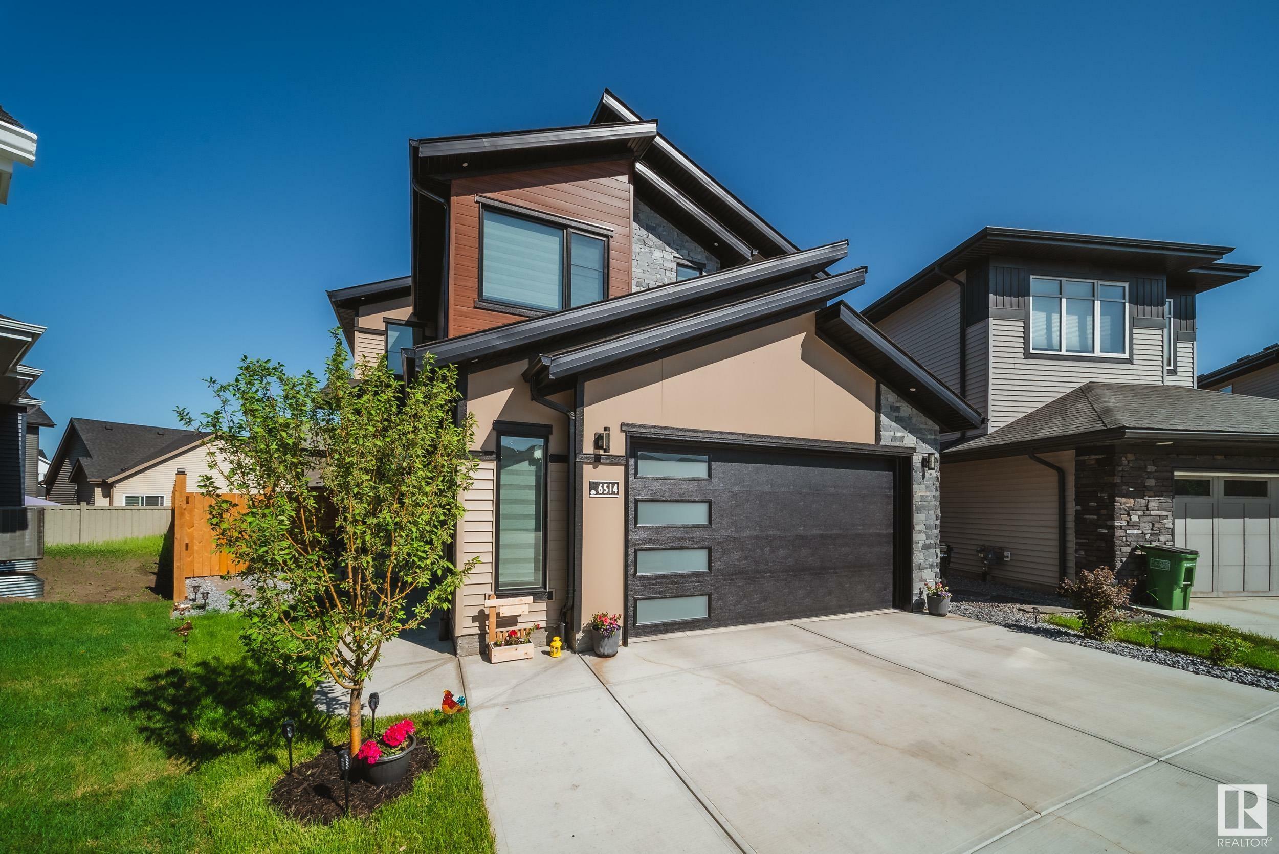 Property Photo: 6514 Crawford Place SW AB T6W 3Y6