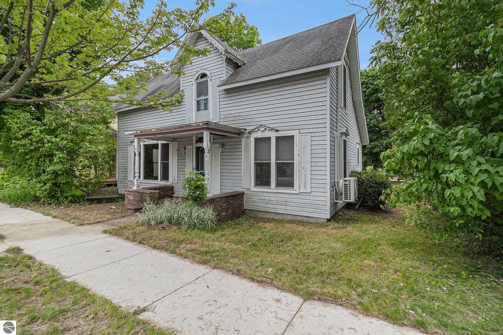 Property Photo:  718 Forest Avenue  MI 49635 
