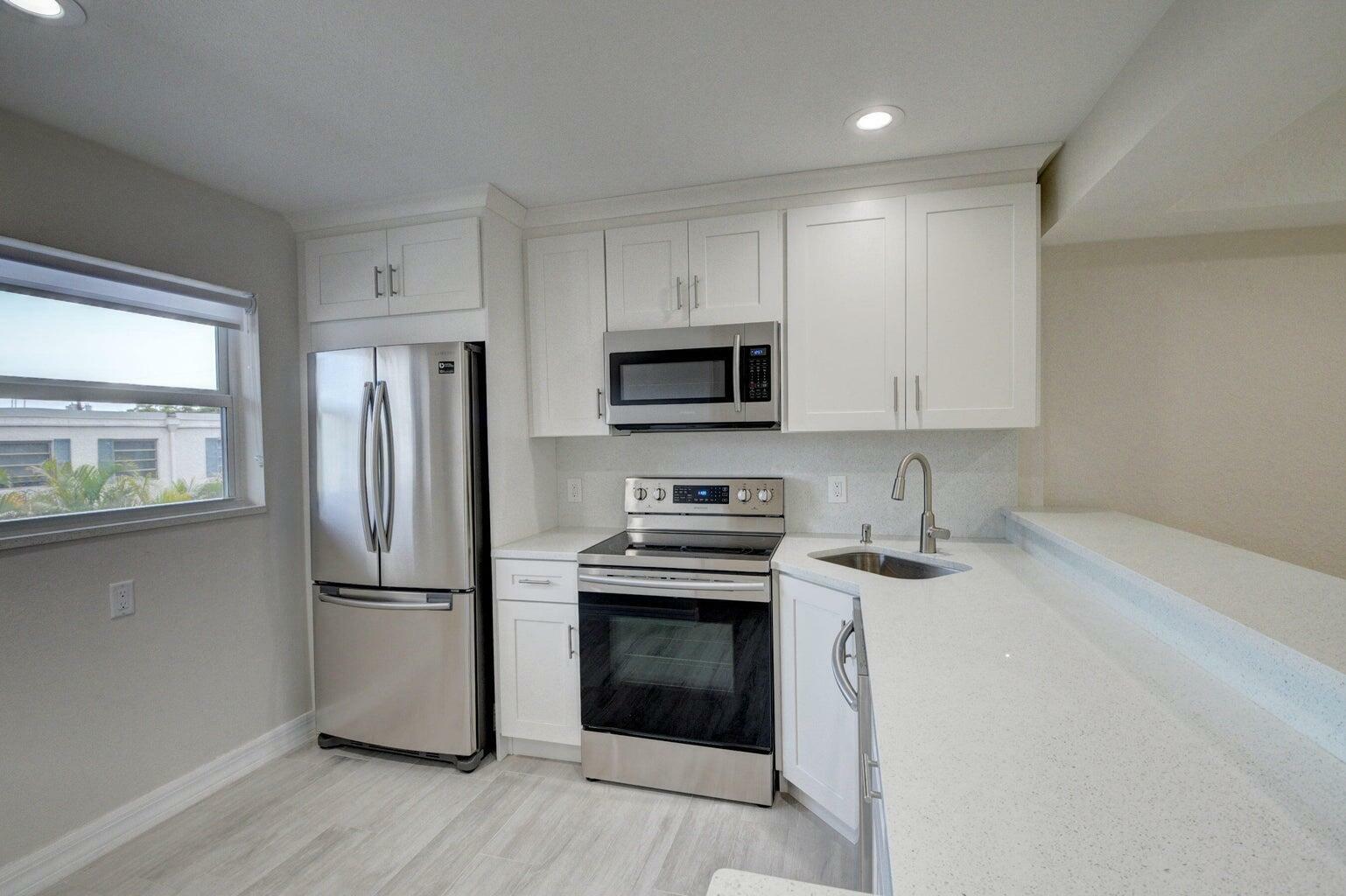 Property Photo:  398 W Camino Real 1  FL 33432 